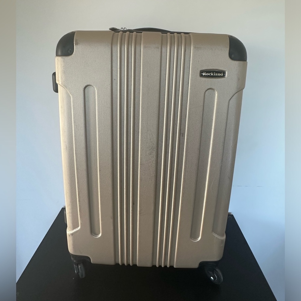 ROCKLAND Sonic Hardside Luggage Case. GOLD